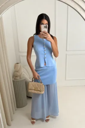 Delilah blue knit waistcoat & pleated sheer maxi skirt