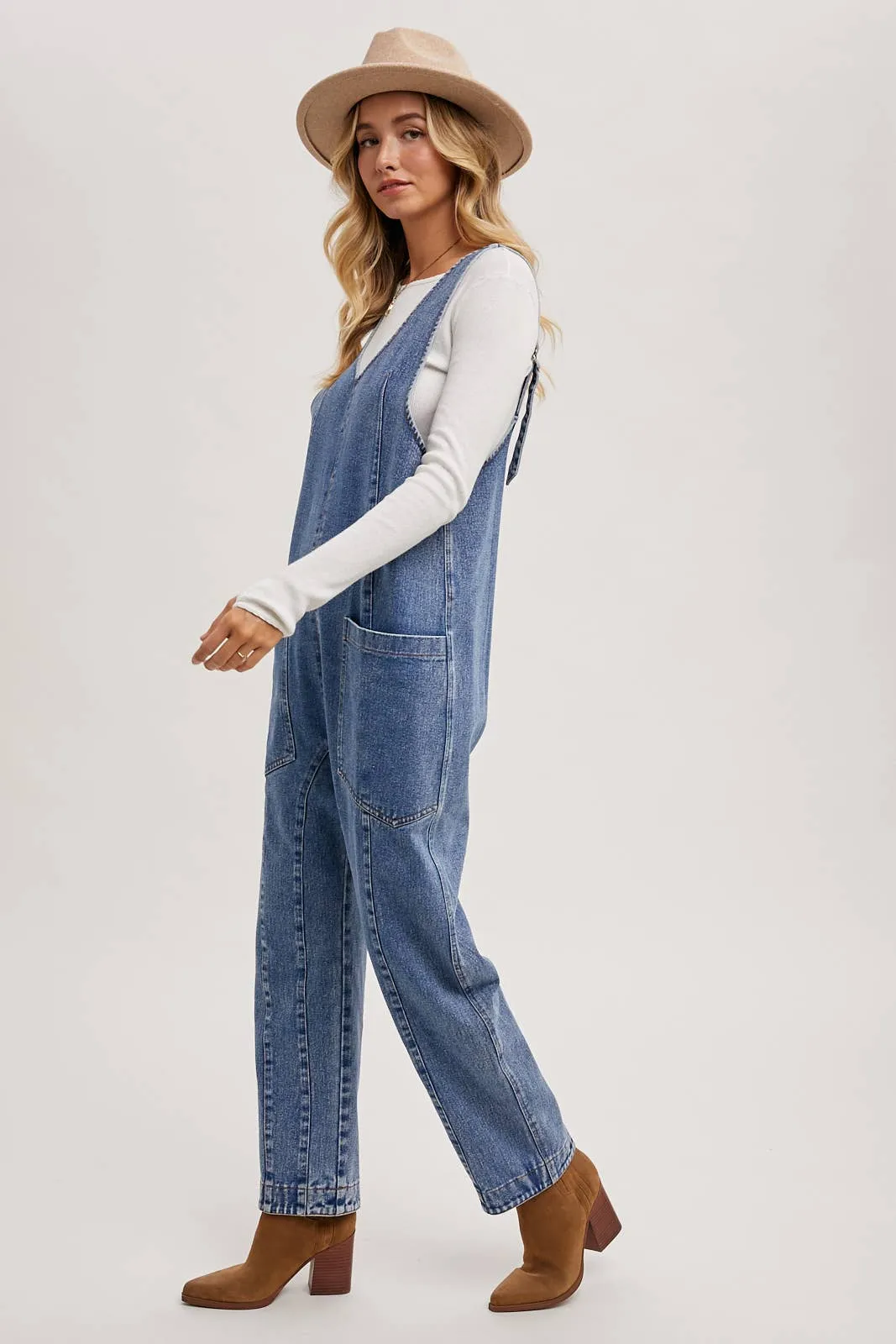 DENIM JUMPSUIT OVERALL IN A RELAXED FIT WITH HAREM LEGS